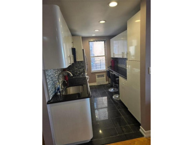WELCOME TO THIS BEAUTIFUL, UPDATED 2 BED, 2 BATHS COOP UNIT WITH