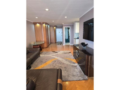 WELCOME TO THIS BEAUTIFUL, UPDATED 2 BED, 2 BATHS COOP UNIT WITH