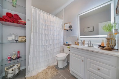 THE ULTIMATE LAKEFRONT HOME! Located in the highly sought-after