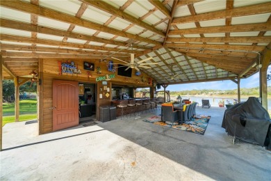 THE ULTIMATE LAKEFRONT HOME! Located in the highly sought-after