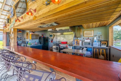 THE ULTIMATE LAKEFRONT HOME! Located in the highly sought-after