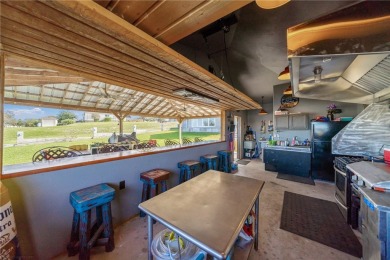 THE ULTIMATE LAKEFRONT HOME! Located in the highly sought-after