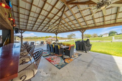 THE ULTIMATE LAKEFRONT HOME! Located in the highly sought-after