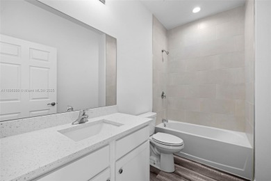 This 4-bedroom, 2-bathroom home, newly built in 2023, offers a