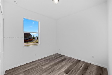 This 4-bedroom, 2-bathroom home, newly built in 2023, offers a