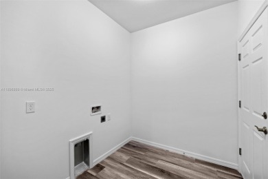 This 4-bedroom, 2-bathroom home, newly built in 2023, offers a