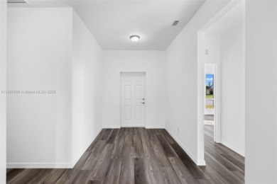 This 4-bedroom, 2-bathroom home, newly built in 2023, offers a