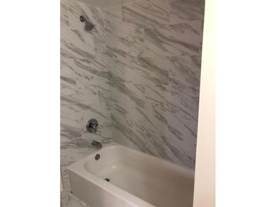 Spacious 3rd-floor apartment featuring a beautifully remodeled