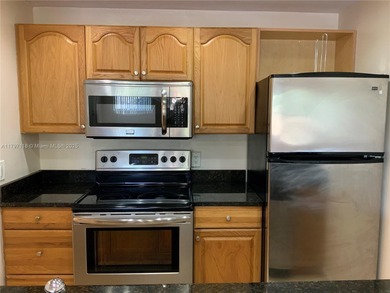 This lovely one-bedroom corner unit features granite tops