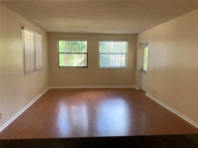 This lovely one-bedroom corner unit features granite tops