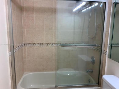 This lovely one-bedroom corner unit features granite tops