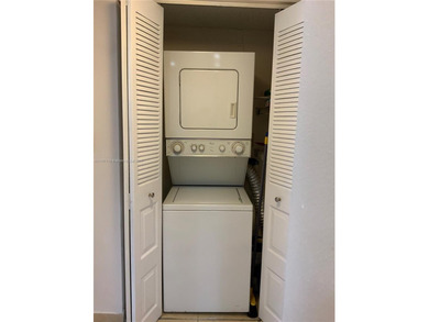 This lovely one-bedroom corner unit features granite tops