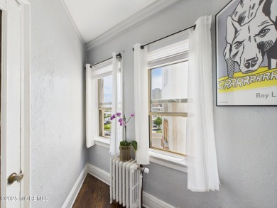 Live Coastal at The Santander This 2BR/1BA condo is where