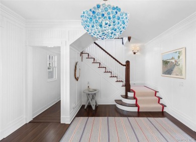 This majestic, one-of-a-kind estate is set on 4+ private