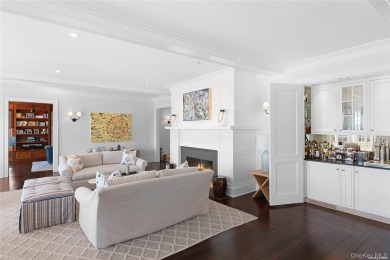 This majestic, one-of-a-kind estate is set on 4+ private