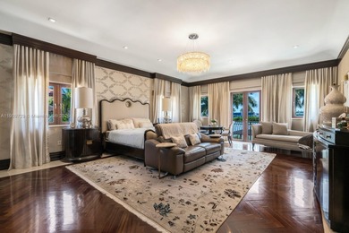 Experience unrivaled waterfront luxury at 210 Palm Avenue, a