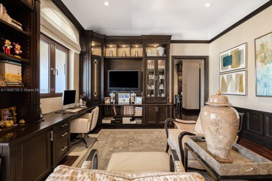 Experience unrivaled waterfront luxury at 210 Palm Avenue, a