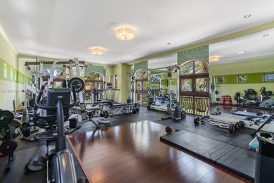 Experience unrivaled waterfront luxury at 210 Palm Avenue, a