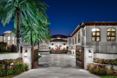 Experience unrivaled waterfront luxury at 210 Palm Avenue, a