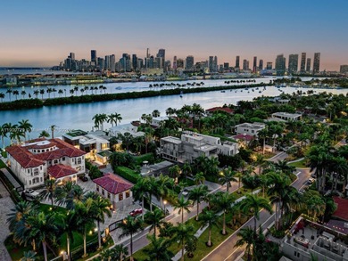Experience unrivaled waterfront luxury at 210 Palm Avenue, a