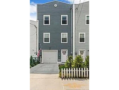 This beautiful, renovated home is a true beach lover's paradise!