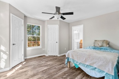 Experience lakeside living at its finest! This beautifully