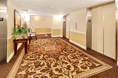 This SW CORNER unit has floor-to-ceiling windows and doors