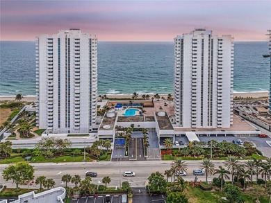 This SW CORNER unit has floor-to-ceiling windows and doors