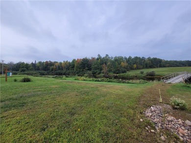 Discover a remarkable 56.49-acre riverfront property offering