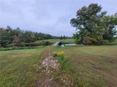 Discover a remarkable 56.49-acre riverfront property offering