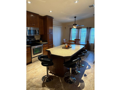 Welcome to your new home in a GATED 55+ community, offering the