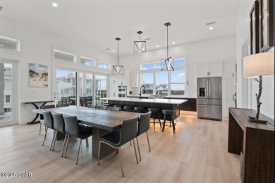 A SHOWSTOPPER of a home! Located in Secluded Dunes subd. This