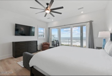 A SHOWSTOPPER of a home! Located in Secluded Dunes subd. This