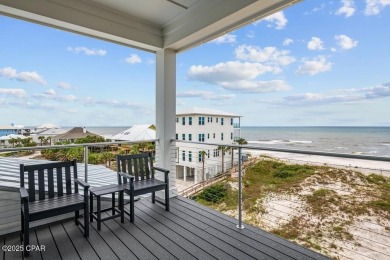 A SHOWSTOPPER of a home! Located in Secluded Dunes subd. This