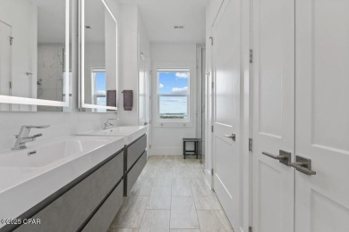 A SHOWSTOPPER of a home! Located in Secluded Dunes subd. This