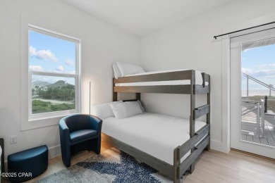 A SHOWSTOPPER of a home! Located in Secluded Dunes subd. This