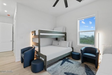 A SHOWSTOPPER of a home! Located in Secluded Dunes subd. This