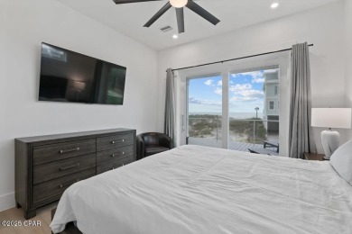 A SHOWSTOPPER of a home! Located in Secluded Dunes subd. This