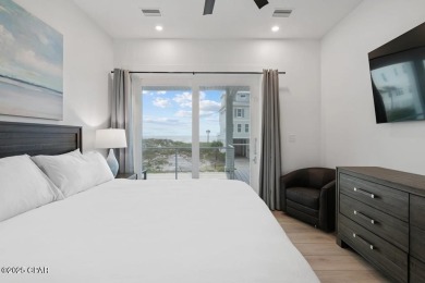 A SHOWSTOPPER of a home! Located in Secluded Dunes subd. This