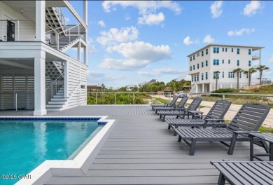 A SHOWSTOPPER of a home! Located in Secluded Dunes subd. This