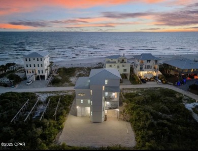 A SHOWSTOPPER of a home! Located in Secluded Dunes subd. This