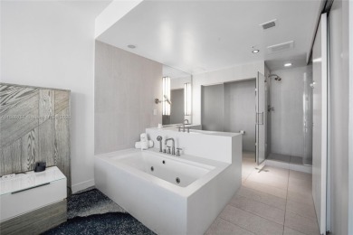 Turn-key and fully furnished 2-bedroom, 2-bath residence at the