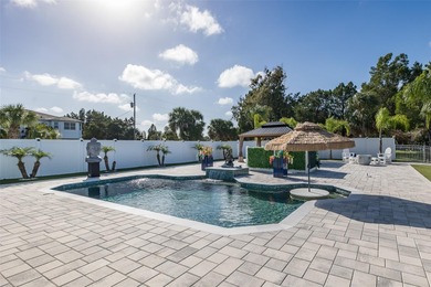 Welcome to the most gorgeous entertaining home in Hernando Beach