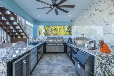 Welcome to the most gorgeous entertaining home in Hernando Beach