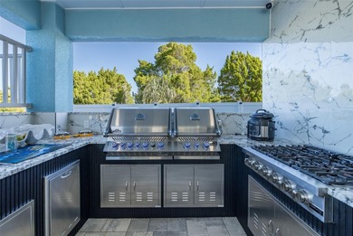 Welcome to the most gorgeous entertaining home in Hernando Beach