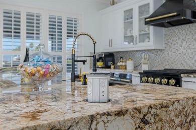 Welcome to the most gorgeous entertaining home in Hernando Beach