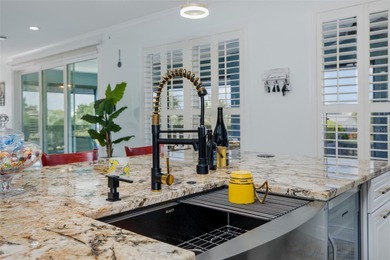 Welcome to the most gorgeous entertaining home in Hernando Beach