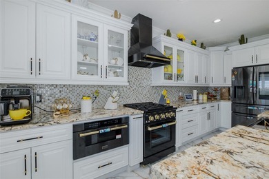 Welcome to the most gorgeous entertaining home in Hernando Beach