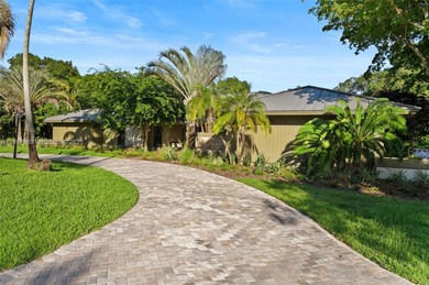 Tucked away on a private cul-de-sac in Pine Bay Estates, this