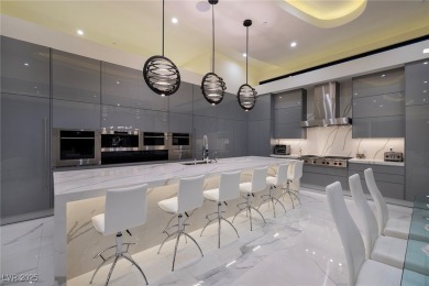 The Highlander Estate in Guard Gated MacDonald Highlands. Modern